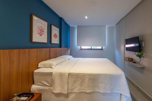 Postel nebo postele na pokoji v ubytování Pé na Areia - 2 Suítes e Jacuzzi em Condomínio de Luxo!