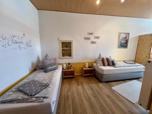 Postel nebo postele na pokoji v ubytování Ferienwohnung Vino Palatina