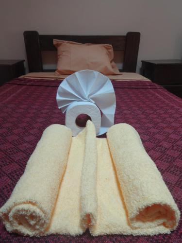 Cama o camas de una habitación en OkiDoki Cusco Hostal