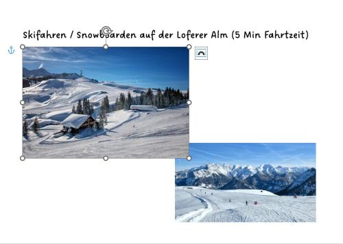 a picture of a snow covered mountain with a ski slope at Große schöne Mansardenwohnung mit 2 Balkonen in Lofer