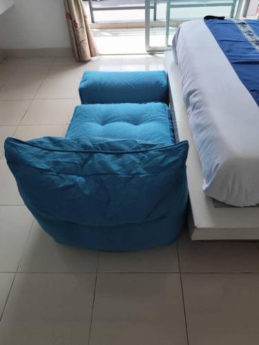 Postel nebo postele na pokoji v ubytování R Hotel Hatyai