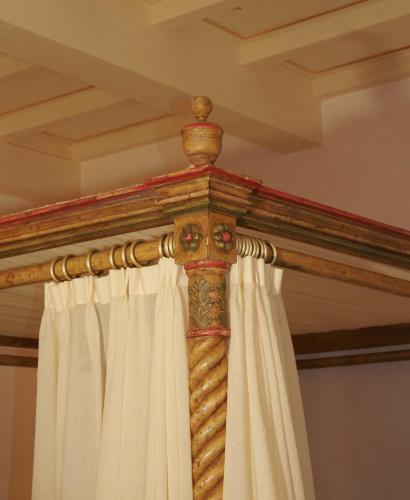 a wooden curtain rod with white curtains in a room at Tenuta Del Gallo in Amelia