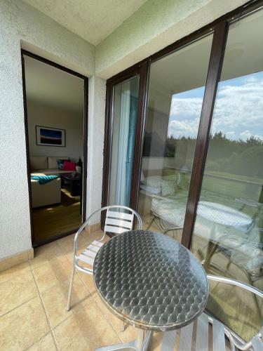 Χώρος καθιστικού στο Picturesque Apartment in beautiful setting surrounded by Mountain and Ski Slope Views