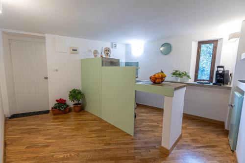 a kitchen with a sink and a counter top at Maison Castro Casetta a Palermo in Palermo