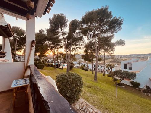 a balcony of a house with a view of a yard at Casa Nova, Moraira in Moraira