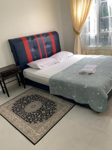 Ένα ή περισσότερα κρεβάτια σε δωμάτιο στο Homestay Tok Ayah 2
