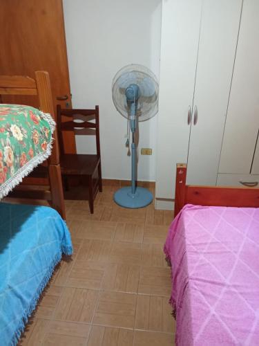 Postel nebo postele na pokoji v ubytování Taty