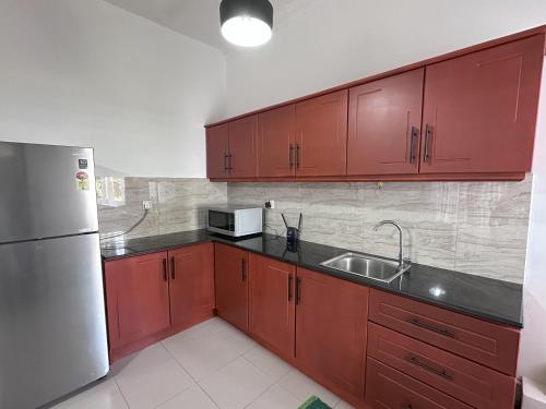 Kuchyň nebo kuchyňský kout v ubytování Urban Nest Studio