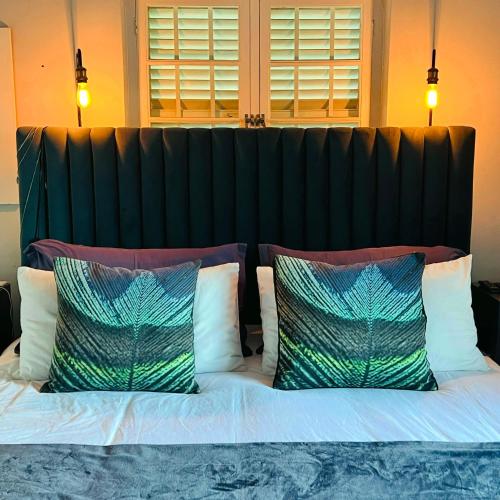 Ένα ή περισσότερα κρεβάτια σε δωμάτιο στο Spacious Stays Residence