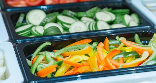 two plastic containers filled with vegetables in at PLAZA INN Goslar in Goslar