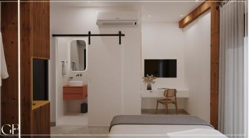 a bedroom with a bed and a sink and a mirror at Sol y Mar Rooms in Vlorë