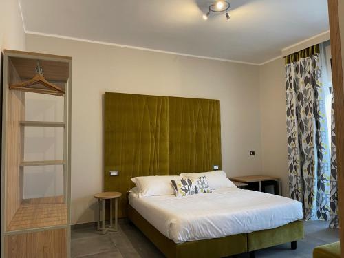 Postel nebo postele na pokoji v ubytování Hotel Sant'Elia
