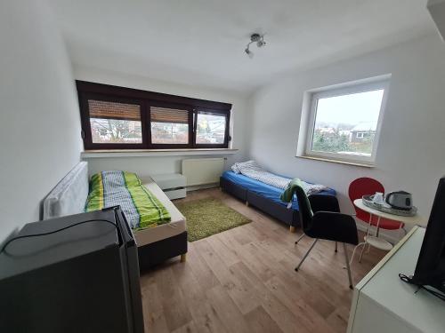 Postel nebo postele na pokoji v ubytování Osnabrück Urban Comfort Room