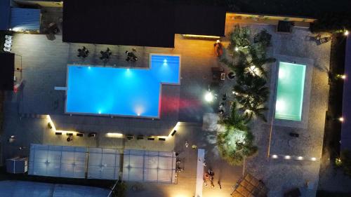 an overhead view of a swimming pool at night at Casa Acito in Stornara