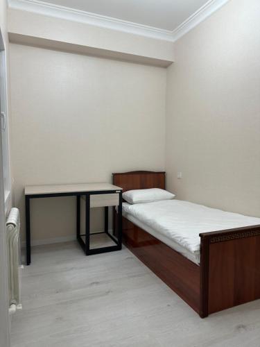 Ένα ή περισσότερα κρεβάτια σε δωμάτιο στο BAURUM Family Apartments