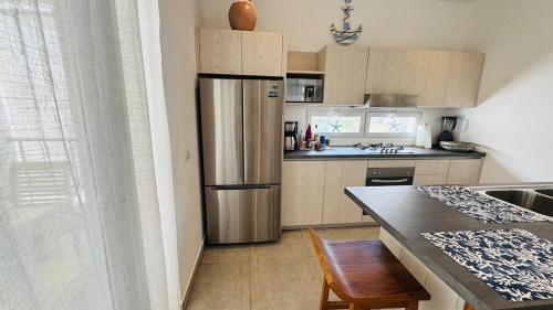 Punta Popy Beach Apartment tesisinde mutfak veya mini mutfak