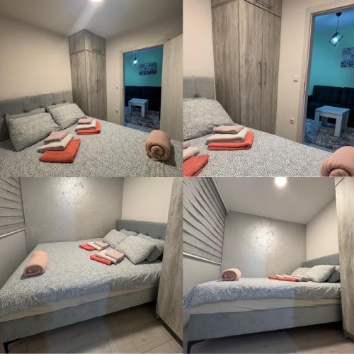 a room with two beds and a mirror at Mini apartman Smile Travnik in Travnik