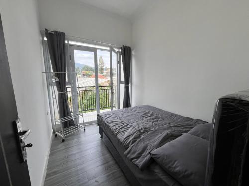 Ένα ή περισσότερα κρεβάτια σε δωμάτιο στο Two Bed Rooms House at Parongpong Near Lembang