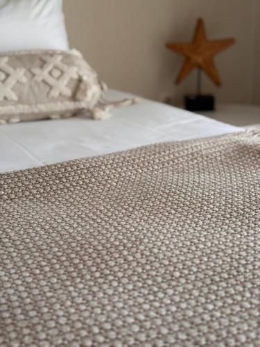 Ένα ή περισσότερα κρεβάτια σε δωμάτιο στο Izla Apartment
