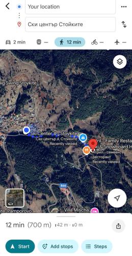 a screenshot of a cell phone with a map at Апартамент Планинско Гнездо - Mountain Nest in Stoykite