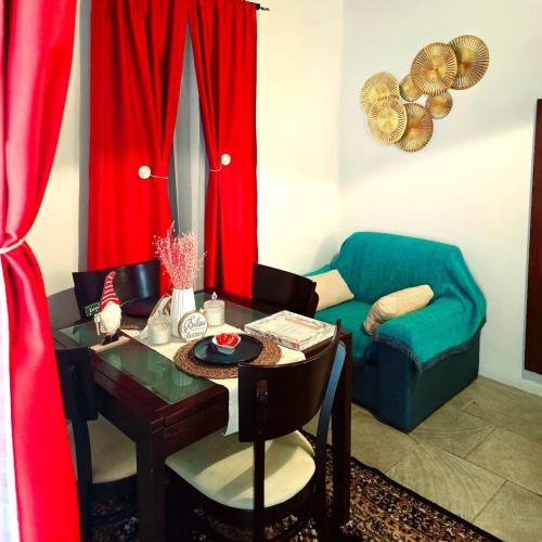 a living room with a table and a chair at Kozakos Luxury House in Pano Lefkara