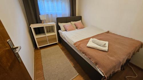 Postel nebo postele na pokoji v ubytování Apartman Angel