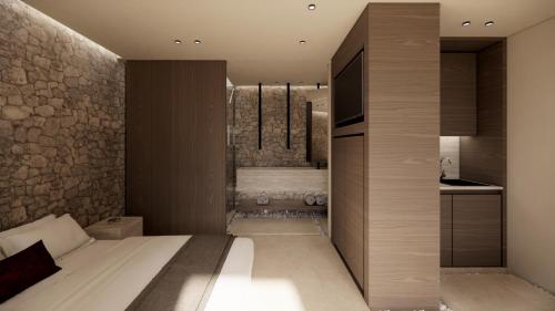 a bathroom with a bed and a shower at Agnadema Apartments in Firostefani