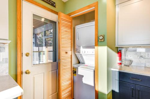 a kitchen with a white refrigerator and a window at Lakefront Cabin Kayaks, Paddle Boards and Fishing in Pocono Lake