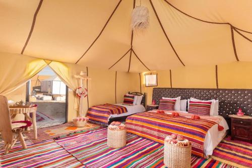 Ένα ή περισσότερα κρεβάτια σε δωμάτιο στο Abdo Luxury Camp with Heating