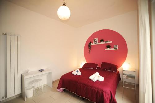 Postel nebo postele na pokoji v ubytování La cornice di Tivoli