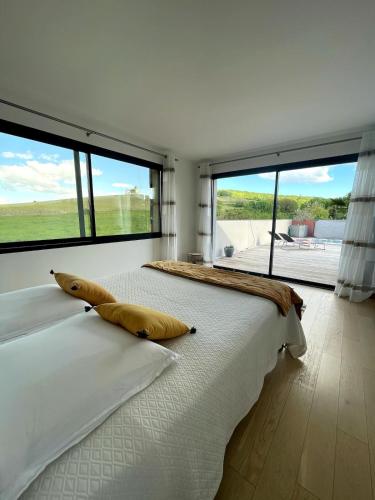 Postel nebo postele na pokoji v ubytování Loft avec Vue