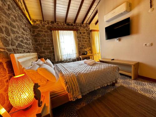 Katil atau katil-katil dalam bilik di Rhea Guesthouse - Pergamon