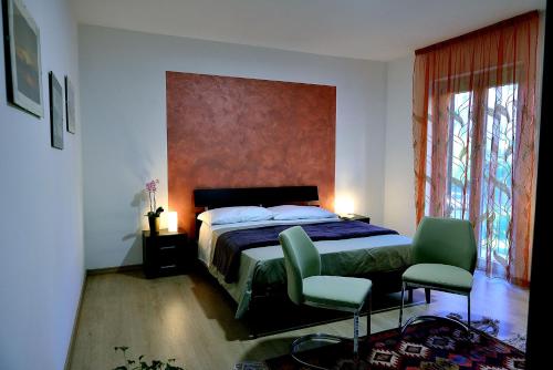 Posteľ alebo postele v izbe v ubytovaní Il triclinio B&B
