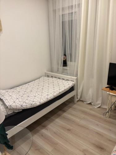 Postel nebo postele na pokoji v ubytování Biały Dom