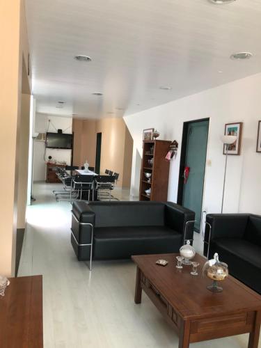 Zona de estar de Casa Espaçosa e Aconchegante
