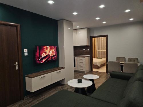 Ruang duduk di Boutique apartment green 2
