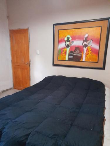 En eller flere senge i et værelse på Casa de Campo El cerrito