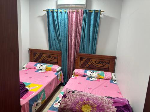 Postel nebo postele na pokoji v ubytování M&H Apartment