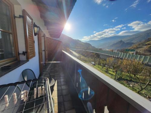 a balcony with a view of a mountain view at Martscholer Weinhof in Chiusa
