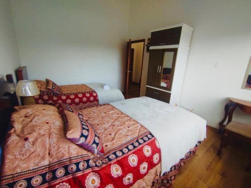 Uma cama ou camas num quarto em Rincon Arrayán