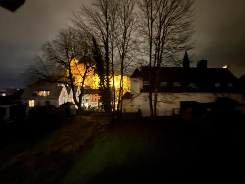 a view of a house at night at Exklusive moderne Ferienwohnung Nr 4 in Kleve - sehr zentral gelegen in Kleve