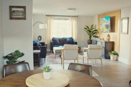 a living room with a table and chairs at NEW! OSU Campus Stadium Boho Glamour in Corvallis