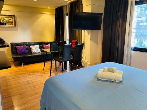 TV a/nebo společenská místnost v ubytování Morada Corbusier Moema - Flat próprio em hotel moderno