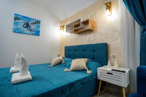 Posezení v ubytování Double room with Balcony Transalpina Ski Resort - DBL1