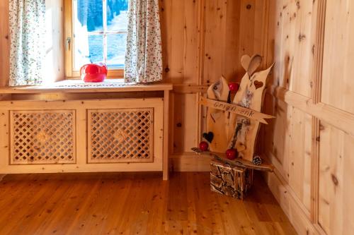 a room with a window and a wooden wall at Steffa Hamat in Ischgl