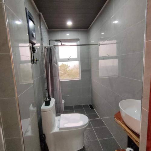 Koupelna v ubytování SkyRidge Homestay