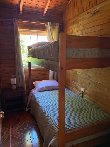Cama o camas de una habitación en Cabañas don Francisco