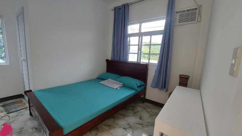 Katil atau katil-katil dalam bilik di Camacho Beachfront House - A Tranquil Secluded Beach
