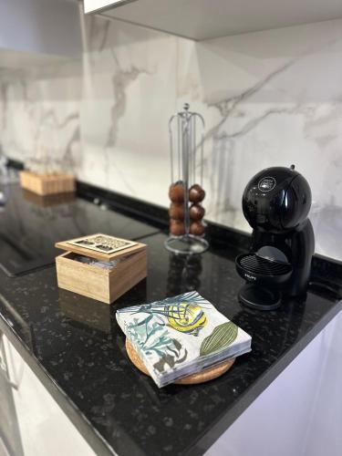 a black counter top with some items on it at Luxury La Restinga in La Restinga