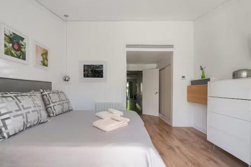 Ένα ή περισσότερα κρεβάτια σε δωμάτιο στο Blue&Greens Apartment